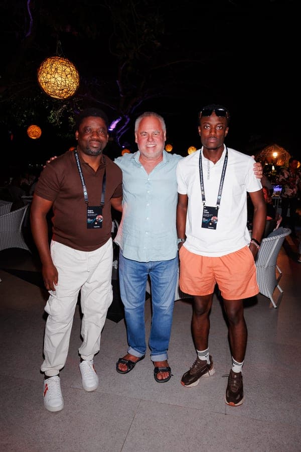Segun Akande with guests at an evening networking event