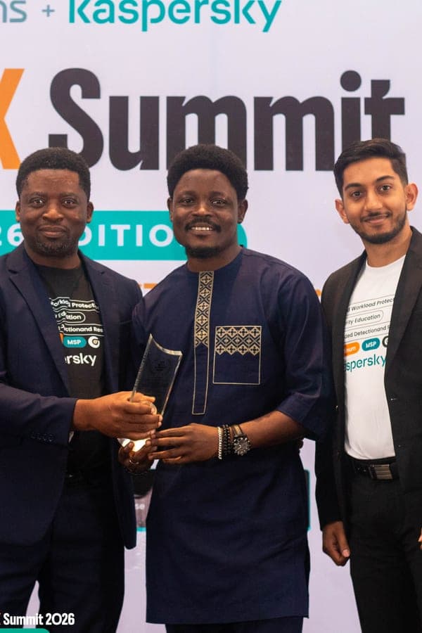 Segun Akande presenting an award at a summit